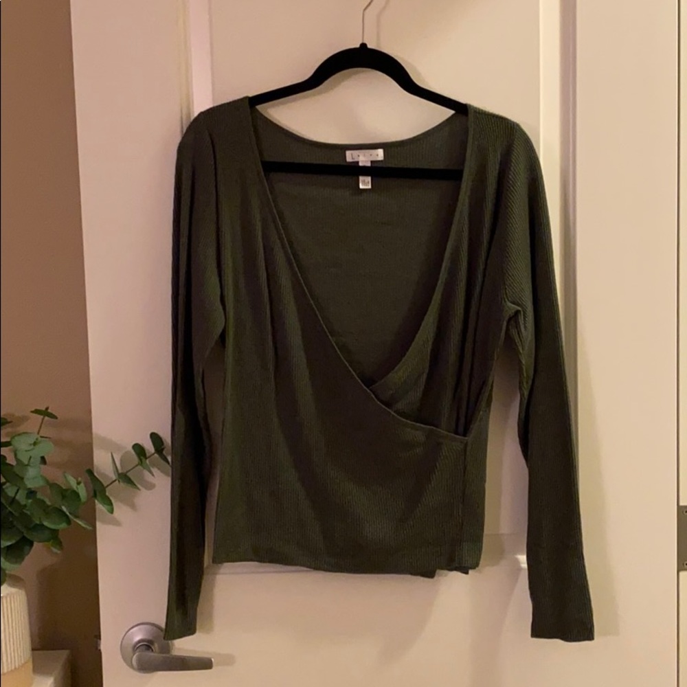 Women’s long sleeve low cut cross sweater